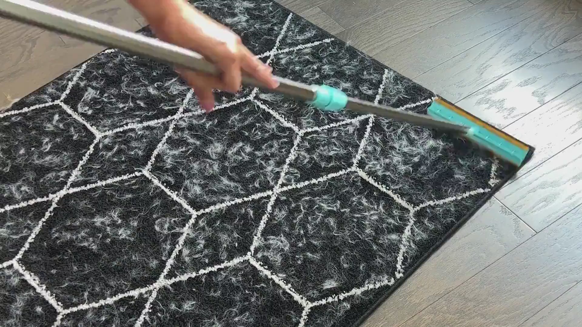 Load video: The video shows the CleaniPet product in action, quickly and easily removing pet hair from various surfaces such as carpets, sofas, car seats, and clothing. The camera highlights close-up shots of the tool collecting hair, demonstrating its effectiveness and ease of use on each surface.